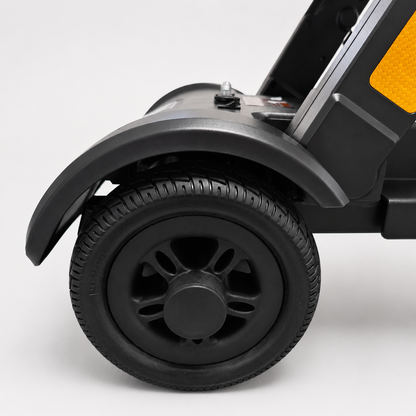 Pink Auto Swift automatic-folding mobility scooter shown from the side