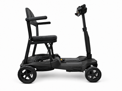 Side view of the black AeroGlide folding mobility scooter, with padded seat, armrests and front LED light.