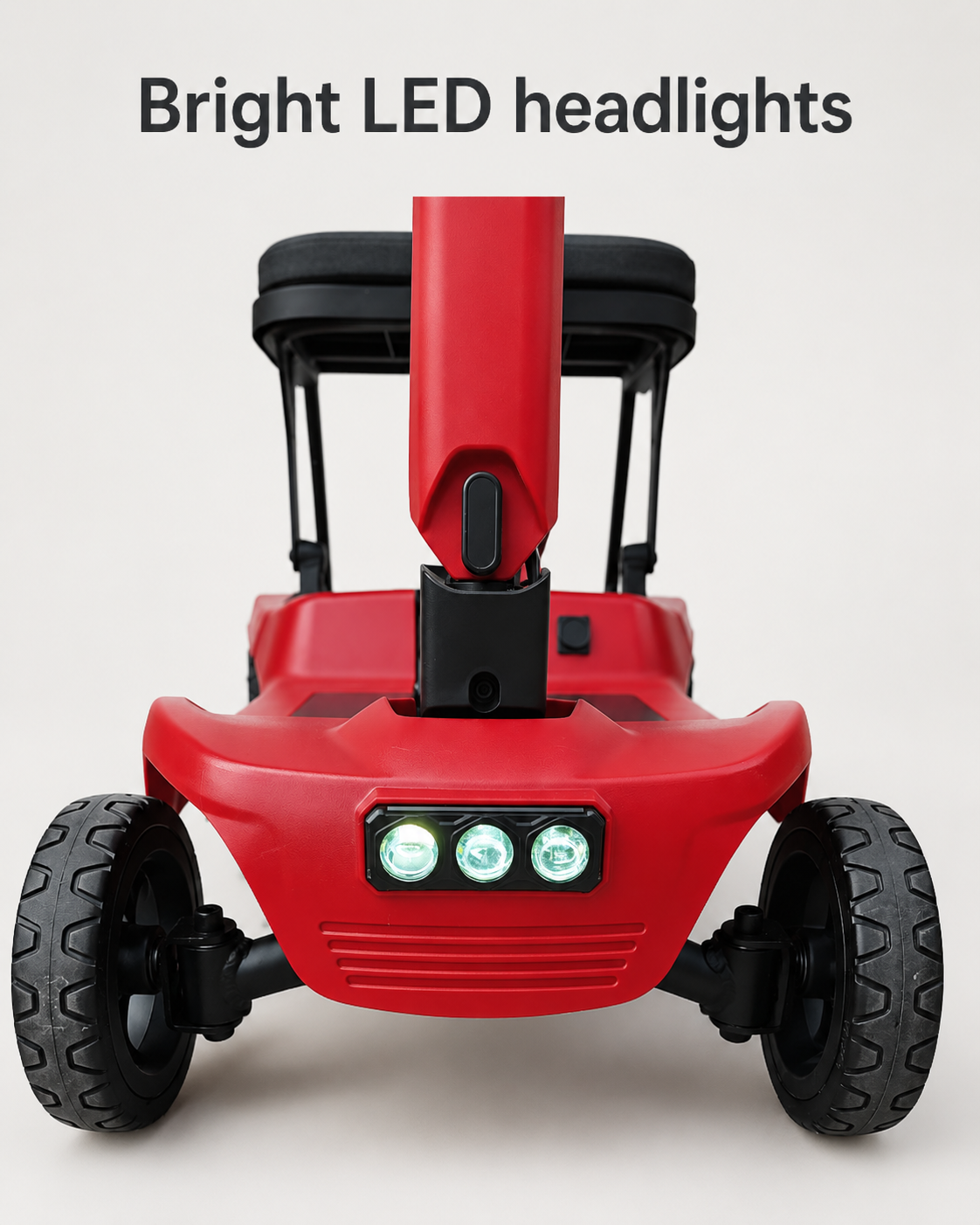 Front view of the red AeroGlide mobility scooter with three LED headlights illuminated.