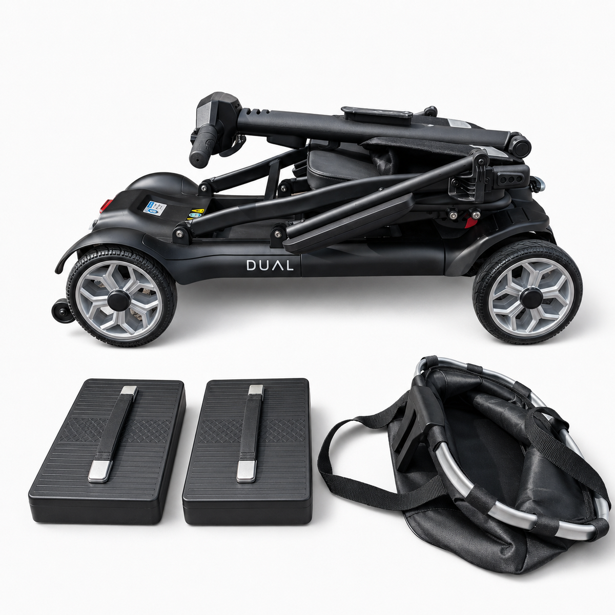 Newbi Move AeroDual folding mobility scooter folded for transport beside two removable lithium batteries and its front basket.