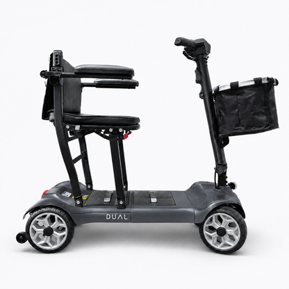 Graphite grey Newbi Move AeroDual folding mobility scooter shown side-on against a white background.