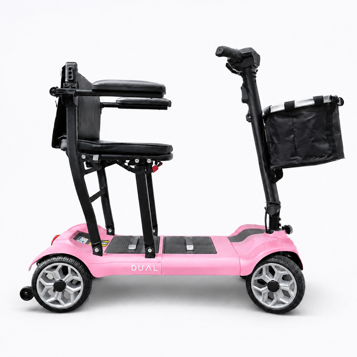 Pink Newbi Move AeroDual folding mobility scooter shown side-on against a white background.