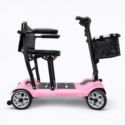 Pink Newbi Move AeroDual folding mobility scooter shown side-on against a white background.